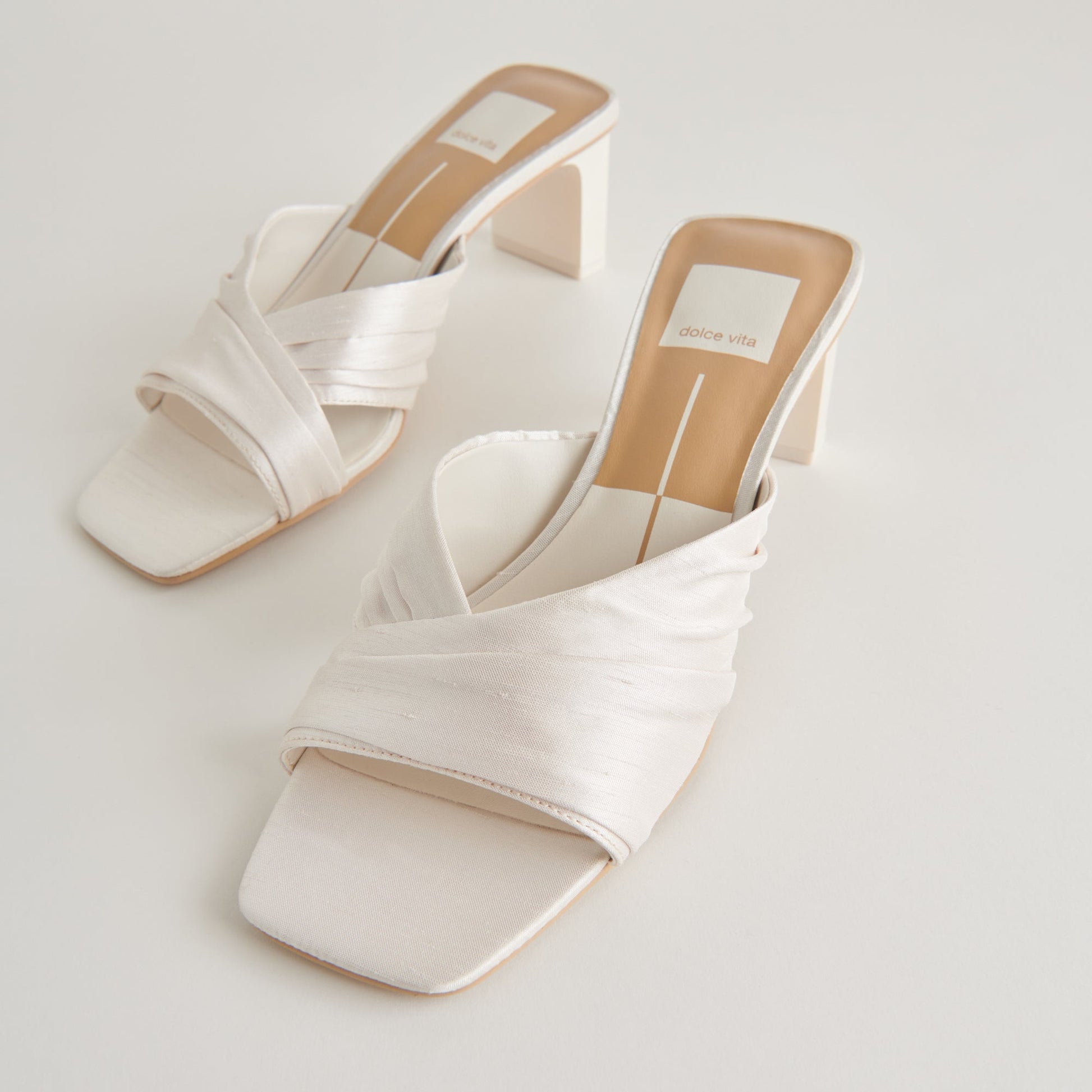 CARLAN HEELS OFF WHITE SILK
 – Dolce Vita