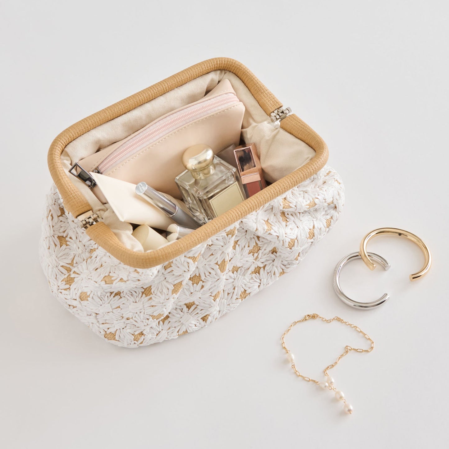 FIORE CLUTCH EMBROIDERED NATURAL RAFFIA
 – Dolce Vita